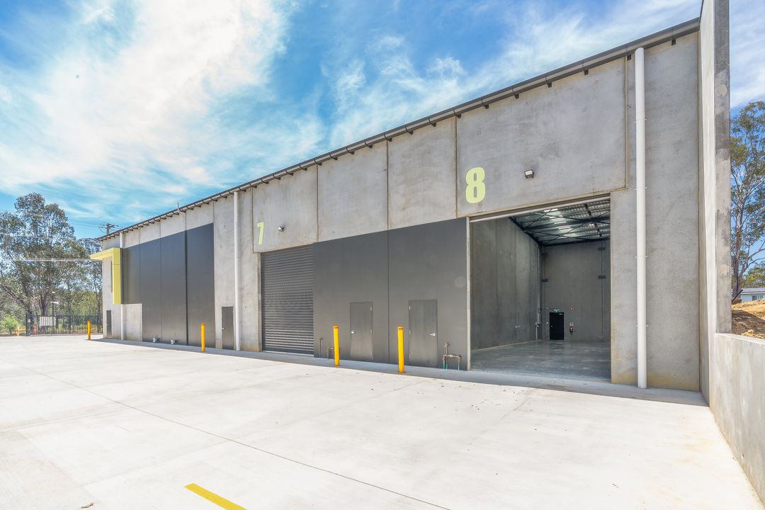 E-Hub Estate, Raceview — roller doors seven and eight, one rolled up